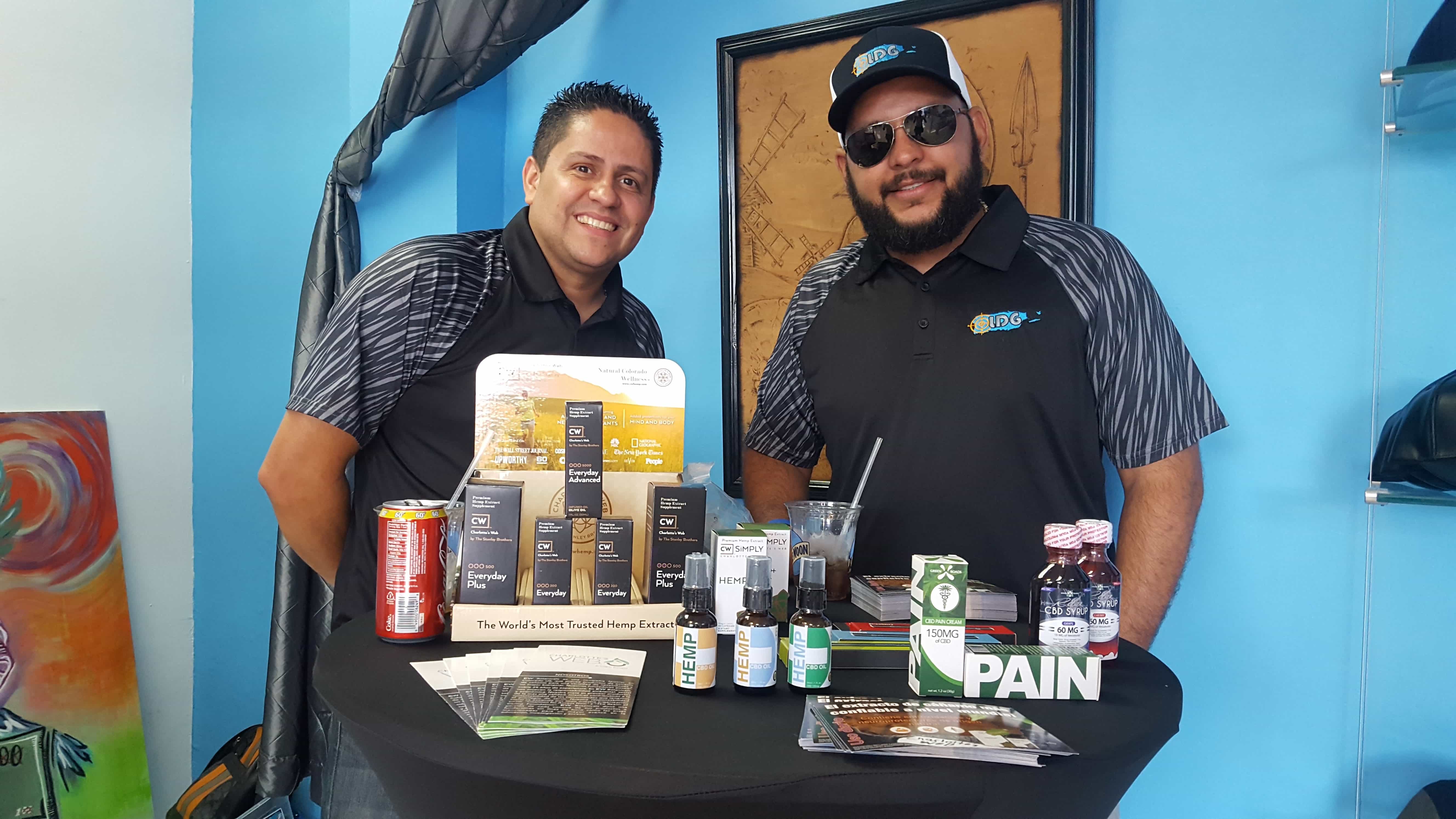Representatives for a CBD company promoting their products in Mayagüez. (Photo courtesy of Vive Boriken and D’Lab)